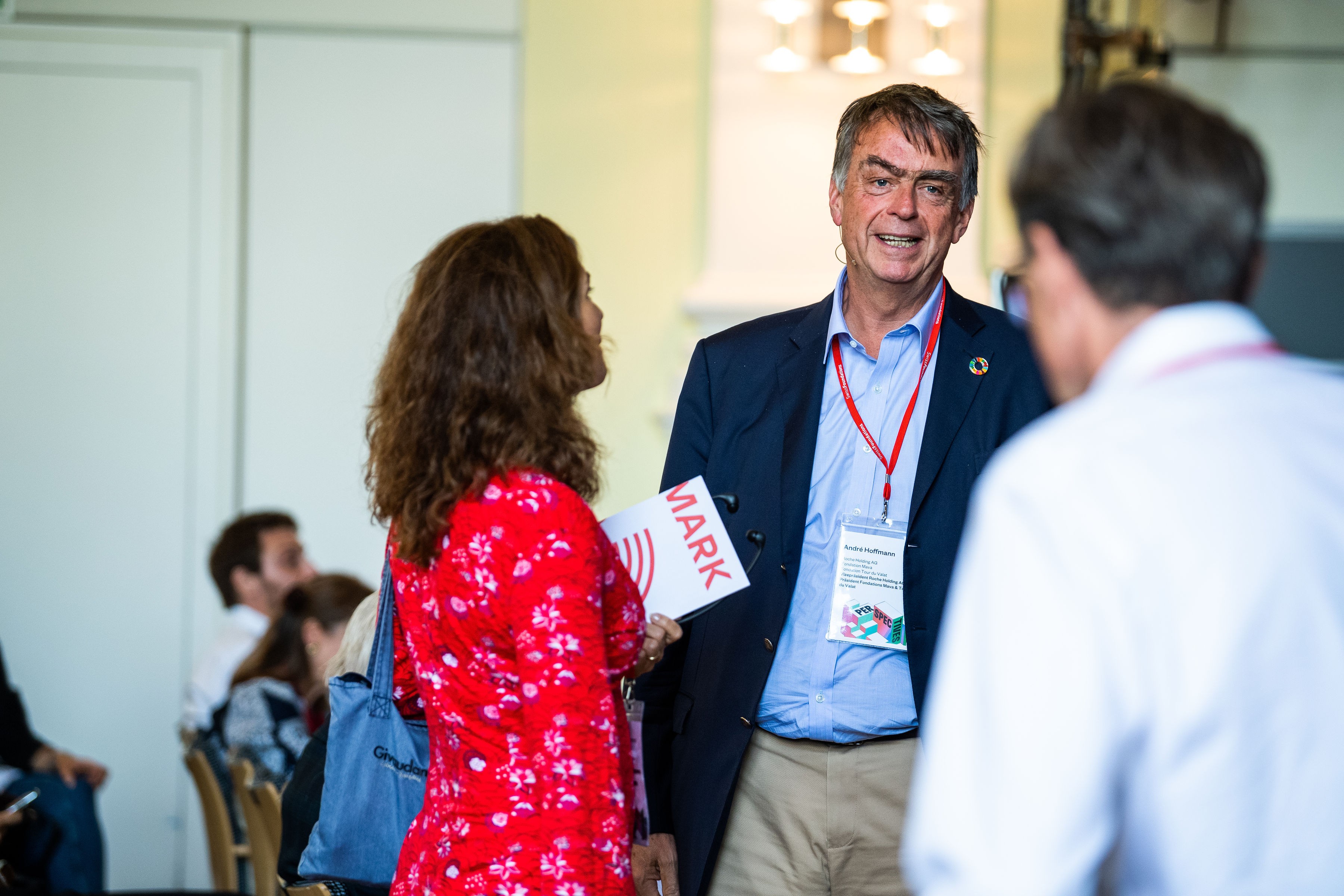 André Hoffmann and Laetitia Vuillement discussing
